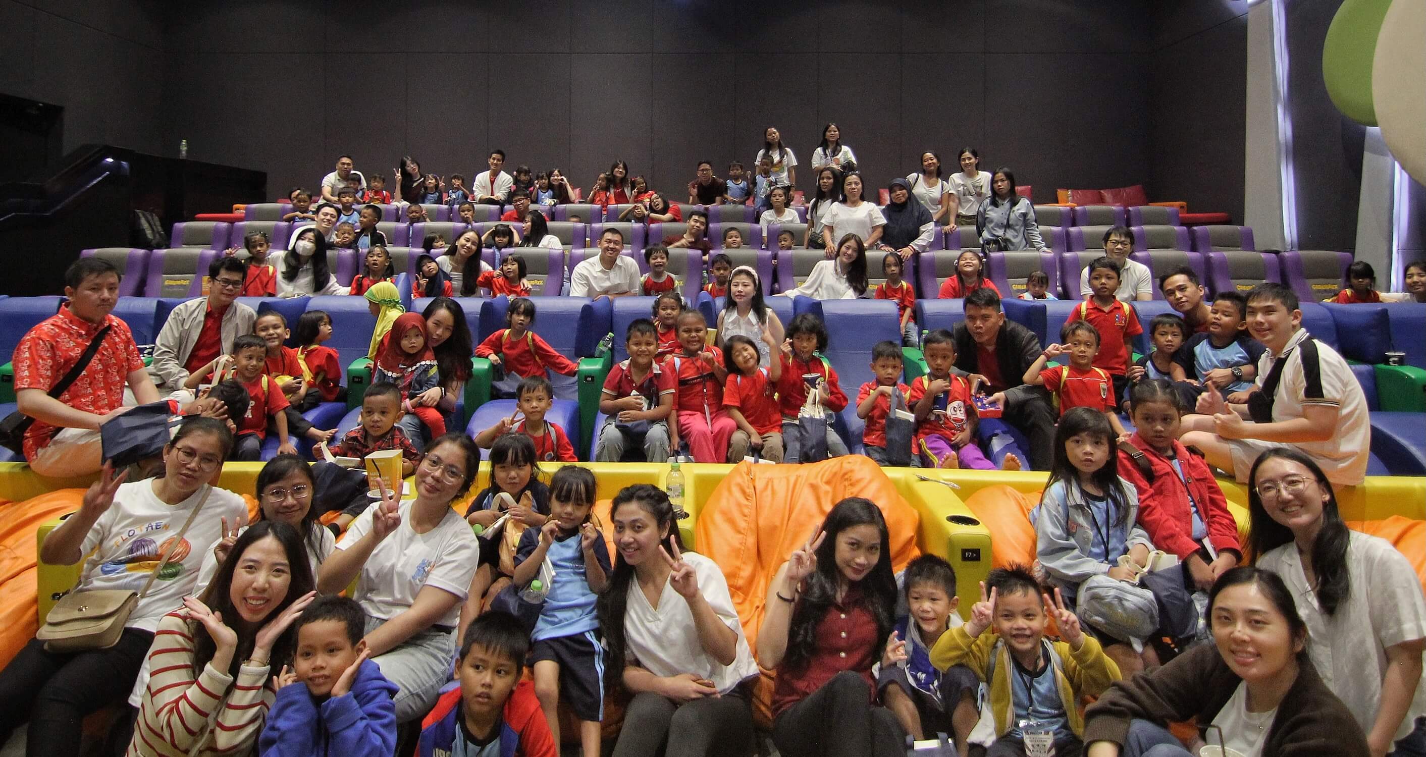 Students and volunteers at the cinema