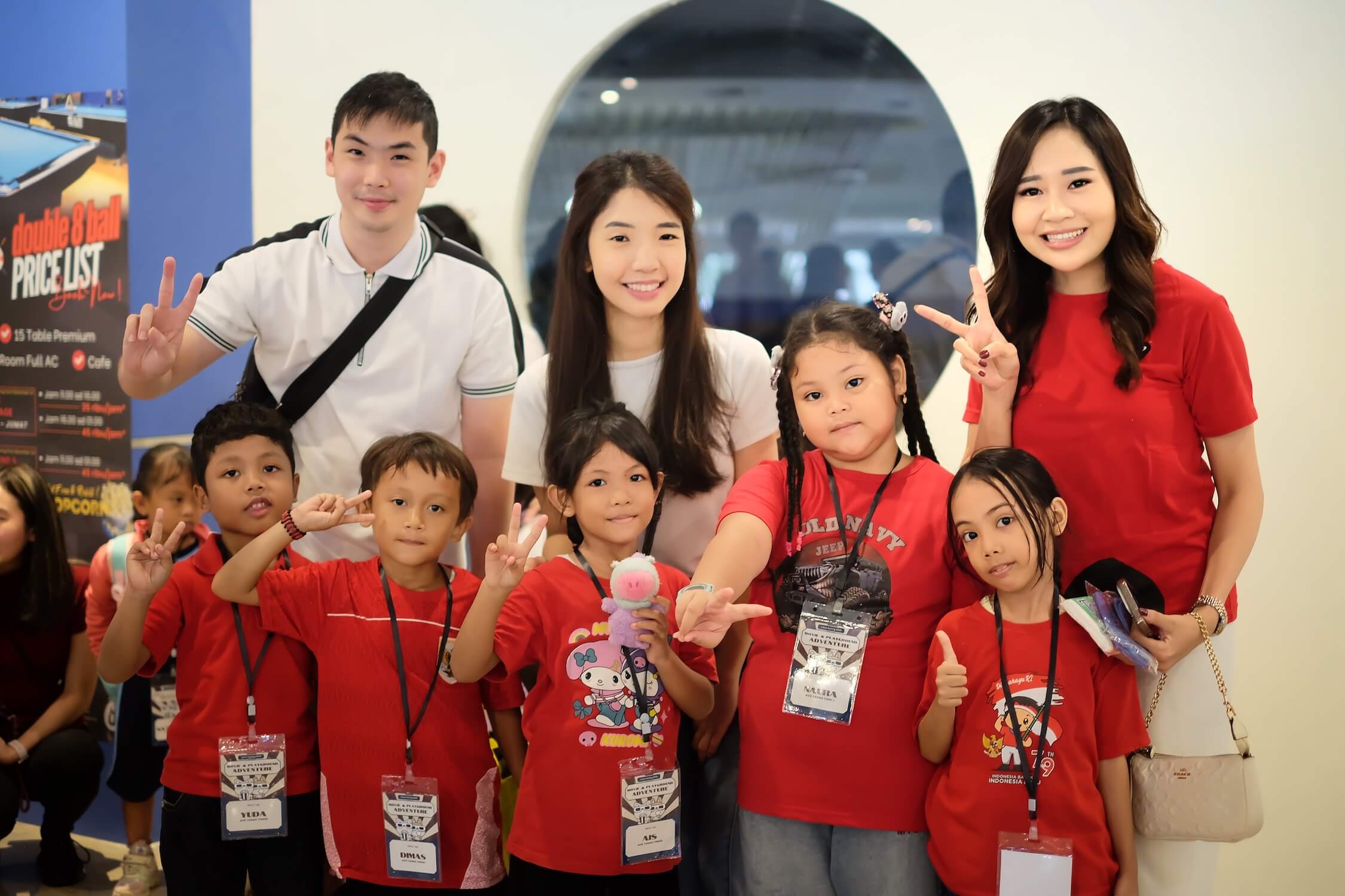 Students and volunteers posing together
